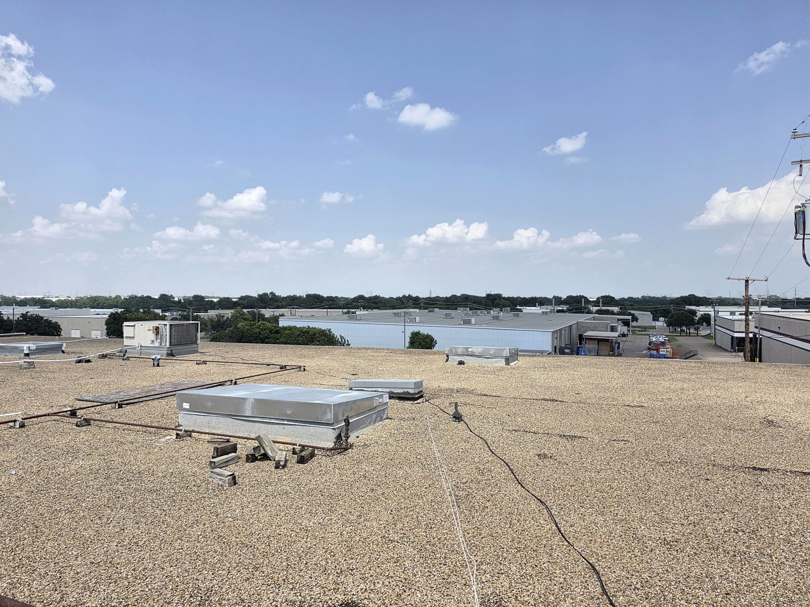 Rooftop HVAC units across a commercial flat roof