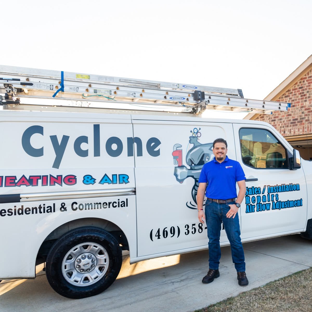 Mario beside the Cyclone Heating & Air service van